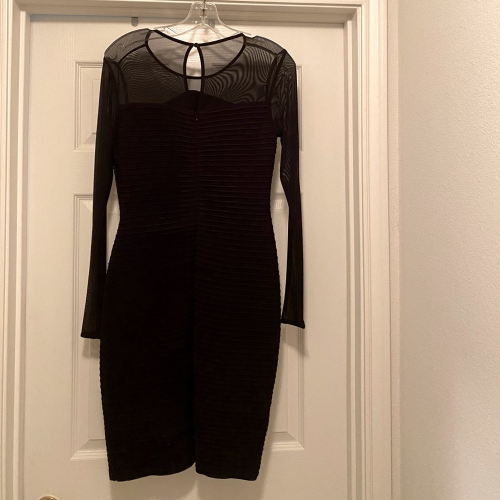 Calvin Klein | All black cocktail dress | sheer sleeves